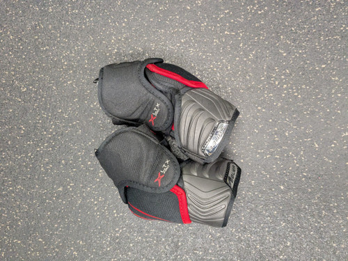 Vist Large View of Product Image Which is Used Bauer VAPOR XLTX PRO Junior Elbow Pads SM