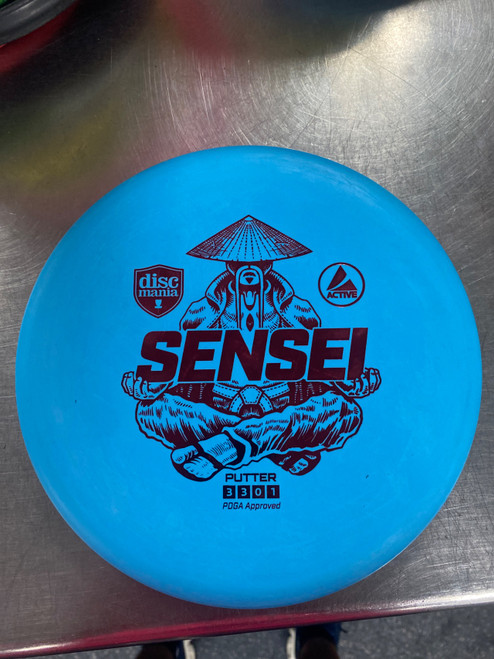 Vist Large View of Product Image Which is Used Discmania SENSEI Disc Golf Putter Royal Blue