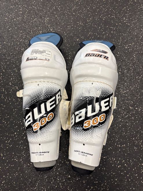 Vist Large View of Product Image Which is Used Bauer 300 SHINS Junior Shin Guards White 11"