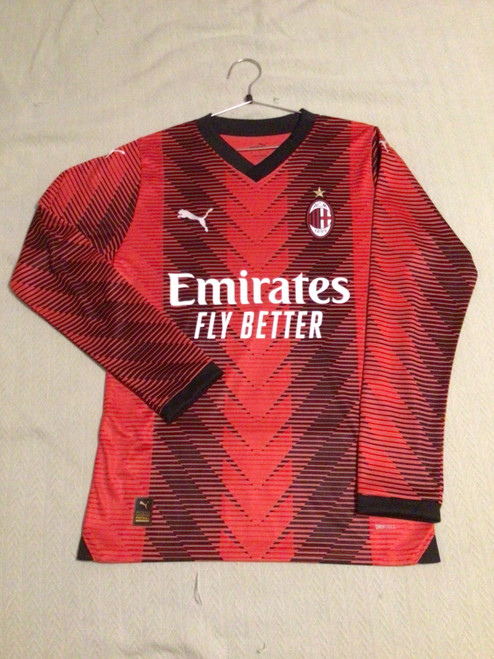 Vist Large View of Product Image Which is NEW Puma AC MILAN PULISIC JERSEY LS Soccer Top Adt Red And Black SM