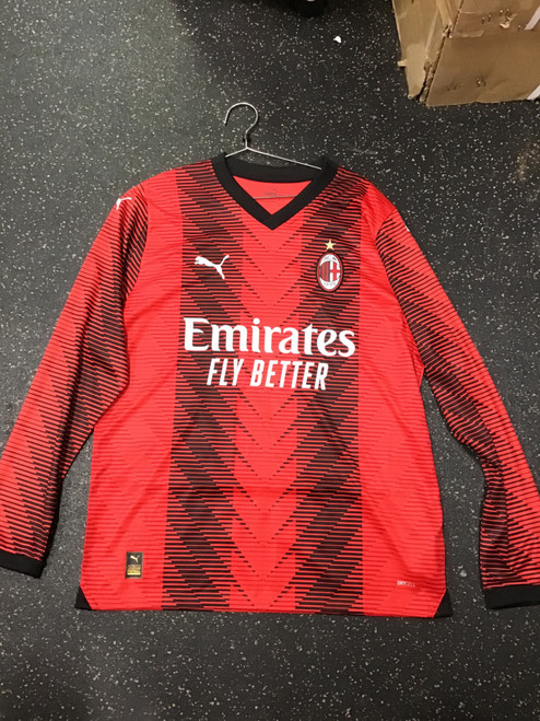 Vist Large View of Product Image Which is NEW Puma AC MILAN PULISIC JERSEY LS Soccer Top Adt Red And Black LG