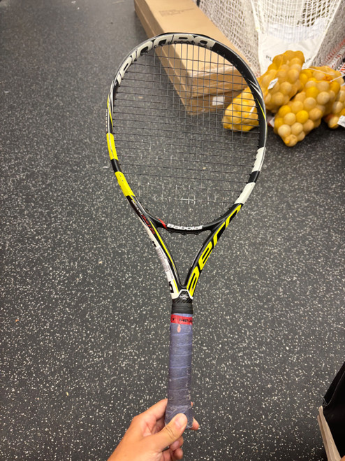 Vist Large View of Product Image Which is Used Babolat AERO STORM TOUR Adult Tennis Racquet Black 4 1/4"