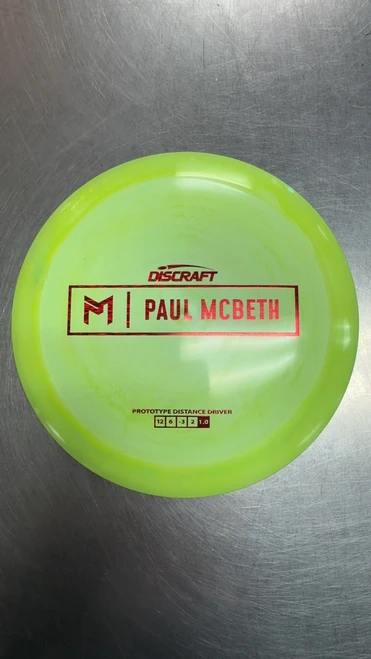 Vist Large View of Product Image Which is Used Discraft PAUL MCBETH PROTO DRIVER Disc Golf Driver Green