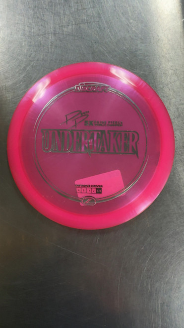 Vist Large View of Product Image Which is Used Discraft PAIGE PIERE ZLINE UNDERTAKER Disc Golf Driver Pink
