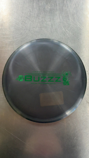 Vist Large View of Product Image Which is Used Discraft DGLO 40TH ANN ED. BUZZZ SS Disc Golf Mid Range Black