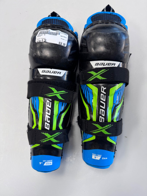 Vist Large View of Product Image Which is Used Bauer X Youth Shin Guards Black 9"