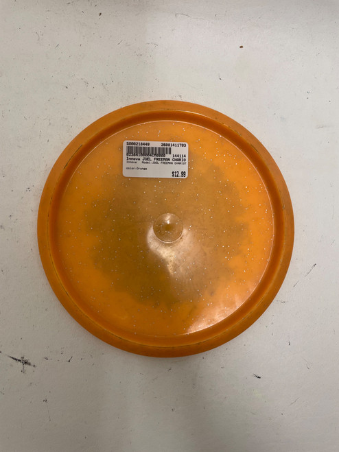 Vist Large View of Product Image Which is Used Innova JOEL FREEMAN CHARIOT Disc Golf Mid Range Orange