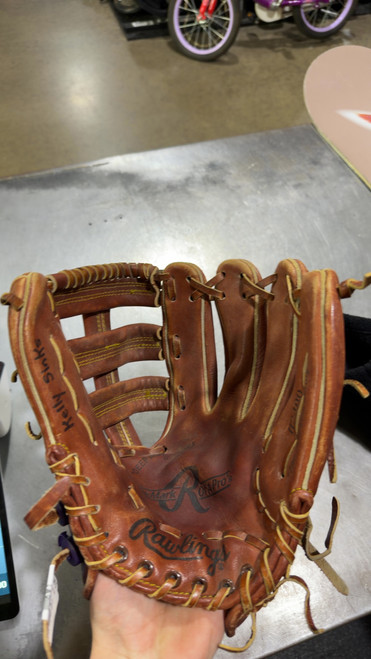 Vist Large View of Product Image Which is Used Rawlings THE MARK OF A PRO BB/SB Glove RH Throw Brown 13"
