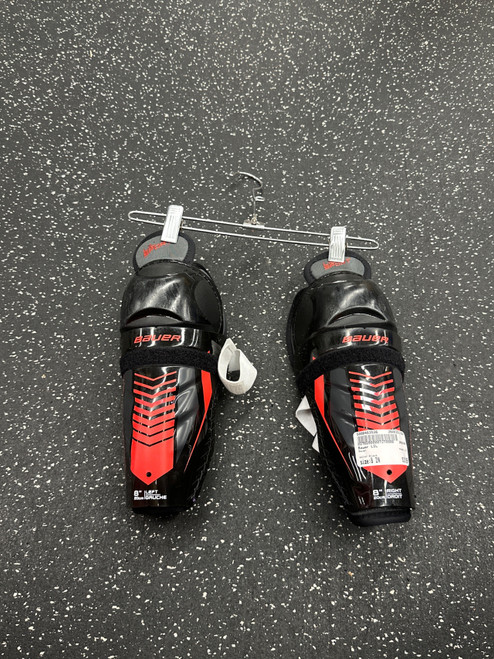 Vist Large View of Product Image Which is Used Bauer LIL Youth Shin Guards Black 8"