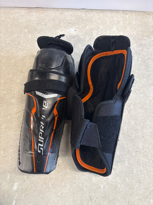 Vist Large View of Product Image Which is Used Bauer SUPREME ONE 4 S/G Junior Shin Guards Black 11"