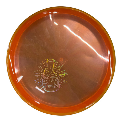 Vist Large View of Product Image Which is Used MVP LAB SECOND PYRO Disc Golf Mid Range Orange 174g