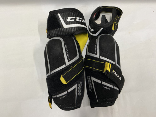 Vist Large View of Product Image Which is Used CCM TACKS 9550 Junior Elbow Pads Black And Yellow LG