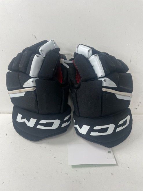 Vist Large View of Product Image Which is Used CCM NEXT Junior Gloves Black 11"