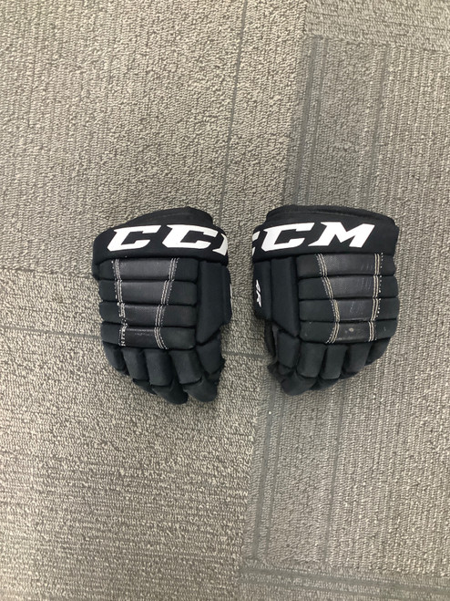 Vist Large View of Product Image Which is Used CCM 4R Youth Gloves Black 9"