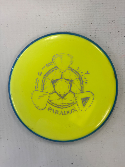 Vist Large View of Product Image Which is Used Axiom PARADOX Disc Golf Mid Range Yellow