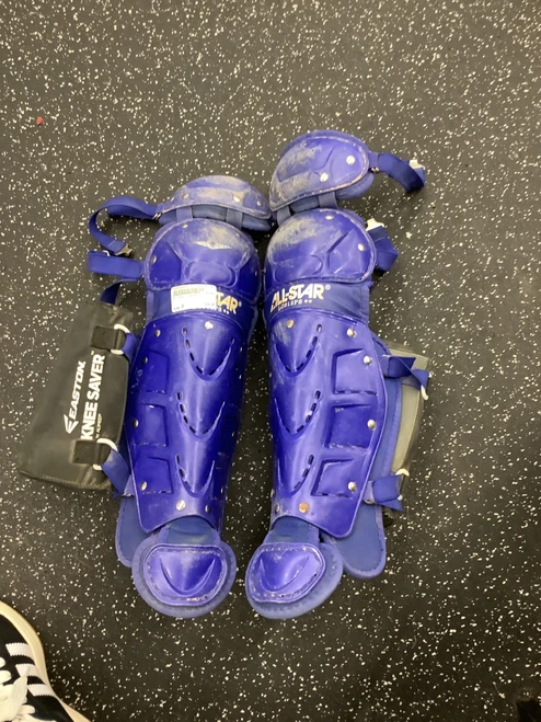Vist Large View of Product Image Which is Used All Star LG912PS Catchers Leg Guards Royal Blue Junior
