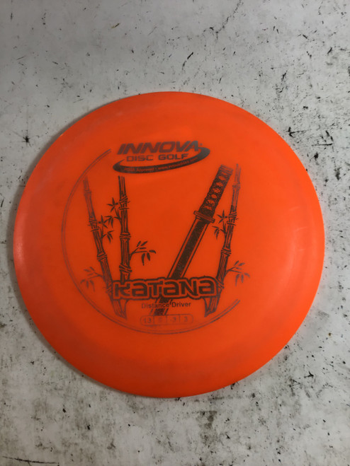 Vist Large View of Product Image Which is Used Innova DX KATANA 141G Disc Golf Driver Orange 150g
