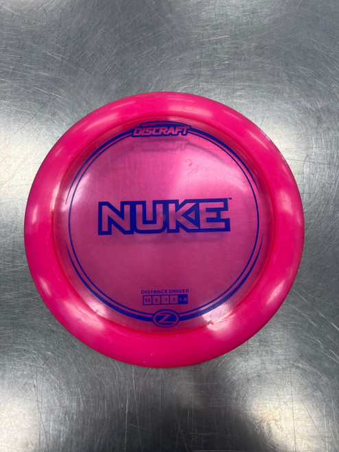 Vist Large View of Product Image Which is Used Discraft NUKE Z Disc Golf Driver Pink