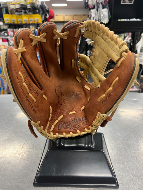 Vist Large View of Product Image Which is Used Rawlings GGE115IBRCPT GG ELITE BB/SB Glove LH Throw Brown 11 1/2"