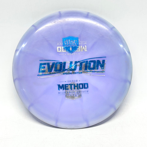Vist Large View of Product Image Which is Used Discmania VAPOR METHOD Disc Golf Mid Range Purple 177g
