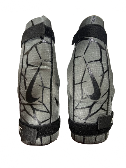 Vist Large View of Product Image Which is Used Nike YOUTH L NIKE VAPOR LT Lacrosse Arm Pads/Guards Black And Grey LG