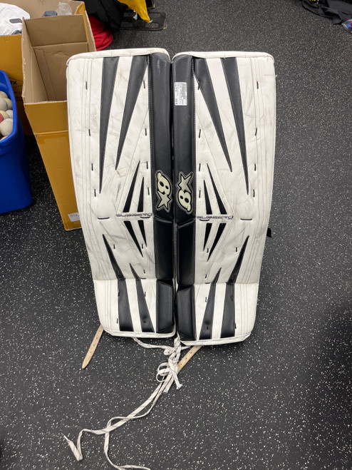 Vist Large View of Product Image Which is Used Brians SUBZERO PRO II Goalie Leg Pads Senior White And Black 35"