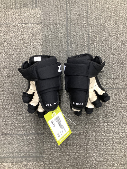 Vist Large View of Product Image Which is Used CCM 4R Youth Gloves Black 9"