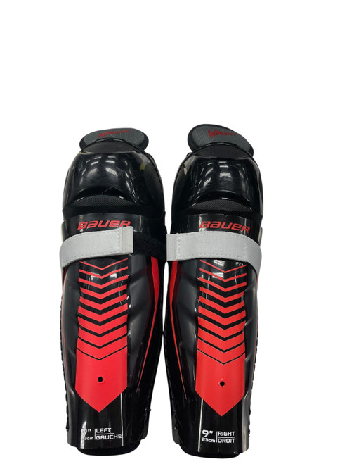 Vist Large View of Product Image Which is Used Bauer LIL SPORT Junior Shin Guards Black 9"