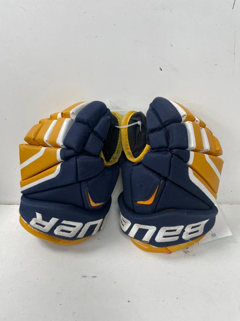 Vist Large View of Product Image Which is Used Bauer VAPOR X80 Junior Gloves Navy Blue And Yellow 11"