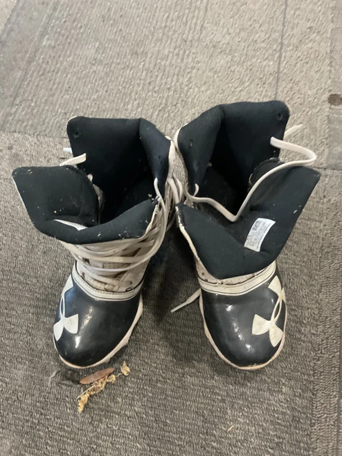 Vist Large View of Product Image Which is Used Under Armour Jr FB Cleats Black Junior 02