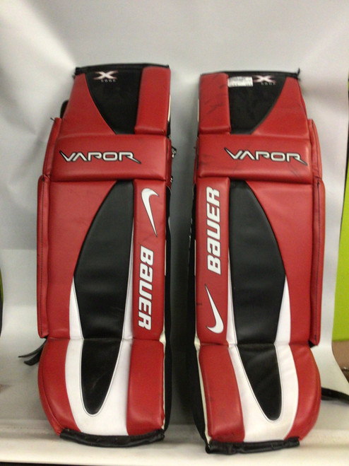 Vist Large View of Product Image Which is Used Bauer NIKE BAUER VAPOR X COMP Goalie Leg Pads Senior Black And Red 34"