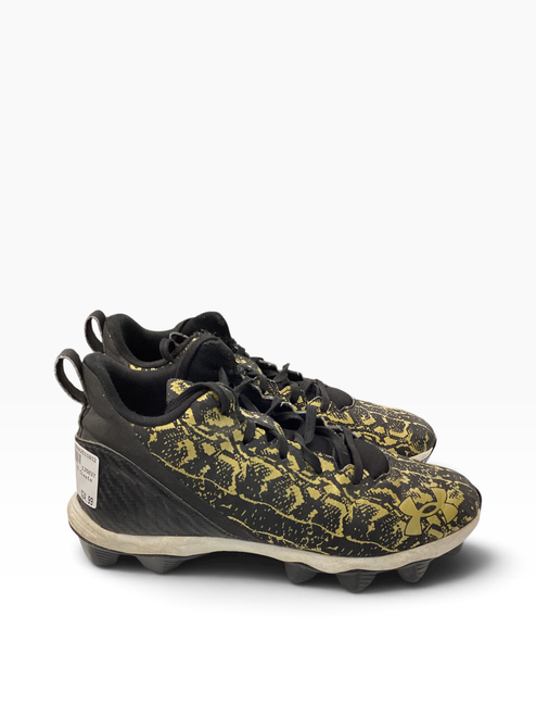 Vist Large View of Product Image Which is Used Under Armour Jr FB Cleats Black And Gold Junior 05