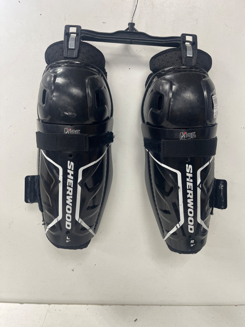 Vist Large View of Product Image Which is Used Sher-wood M65 Youth Shin Guards Black 9"