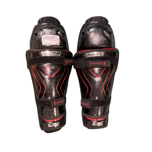 Vist Large View of Product Image Which is Used Bauer VAPOR LTX PRO Junior Shin Guards Black 12"