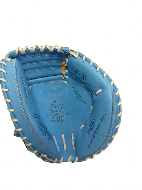 Vist Large View of Product Image Which is New Rawlings HEART OF THE HIDE PRORCM33CBW Pro Grade Catchers Mitt RH Throw Carolina Blue 33" - No Tags