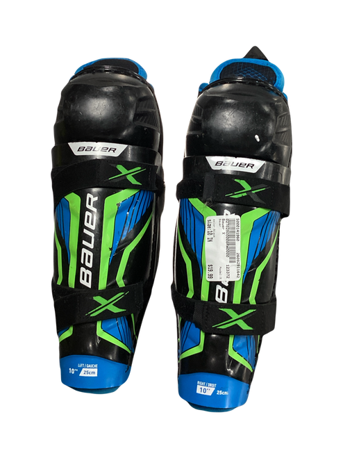 Vist Large View of Product Image Which is Used Bauer X Junior Shin Guards Black 10"