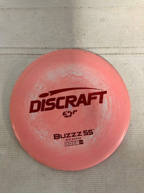 Vist Large View of Product Image Which is Used Discraft BUZZZ ESP Disc Golf Mid Range Pink 176g
