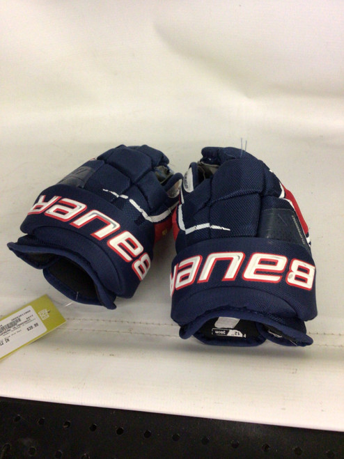 Vist Large View of Product Image Which is Used Bauer SUPREME ULTRASONIC Intermediate Gloves Navy Blue And Red 12"