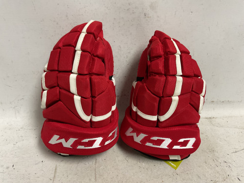 Vist Large View of Product Image Which is Used CCM HG 9K Senior Gloves Red And White 14"