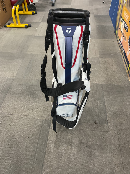 Vist Large View of Product Image Which is Used Taylormade FLEX TECH LITE STAND BAG Mens Stand Bag White/Red/Navy