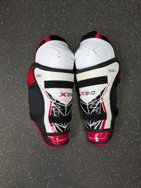 Vist Large View of Product Image Which is Used Bauer VAPOR X80 Junior Shin Guards White 12"