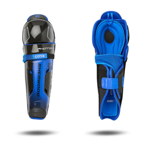 Vist Large View of Product Image Which is Sherwood CODE Photon 2 shin guards deliver dependable mobility and breathable protection in a tapered, low-profile fit. The Featherlite construction keeps things lightweight with EVA foams for consistent impact protection and airflow, while the Microban® antimicrobial liner helps keep your gear fresher longer. The 360⁰ Wrap system locks in a secure fit, ensuring everything stays in place to absorb blocked shots and slashes and deliver consistent protection shift after shift. Built for amateur-level performance, they deliver essential impact resistance for all levels of play.