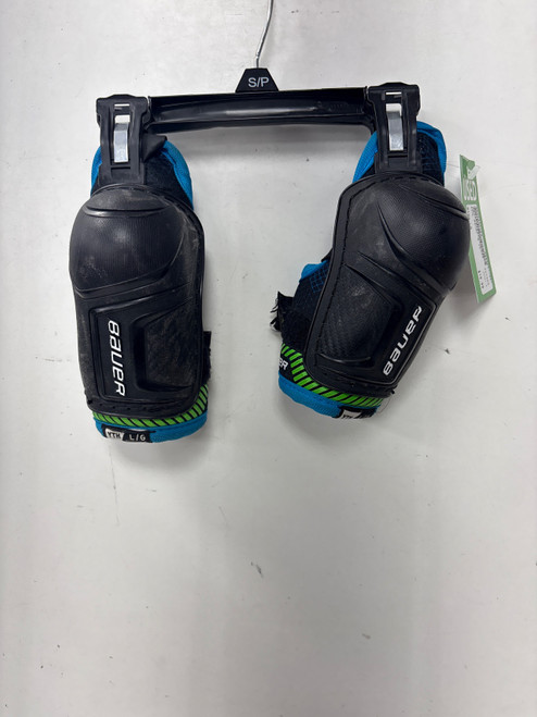 Vist Large View of Product Image Which is Used Bauer X Youth Elbow Pads LG