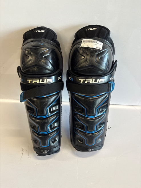 Vist Large View of Product Image Which is Used True XC9 S/G Junior Shin Guards Black 11"