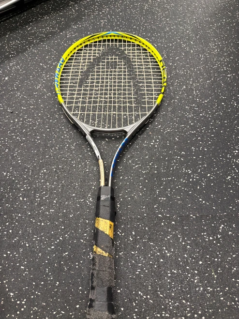 Vist Large View of Product Image Which is Used Head TI REWARD Adult Tennis Racquet Yellow 4 1/4"