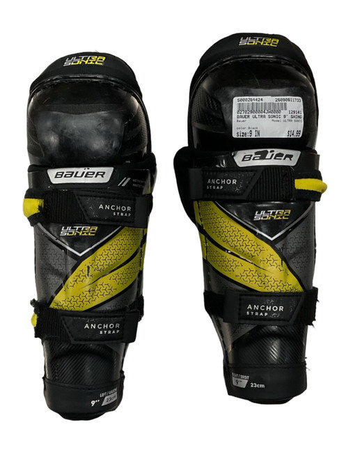 Vist Large View of Product Image Which is Used Bauer ULTRA SONIC Youth Shin Guards Black 9"