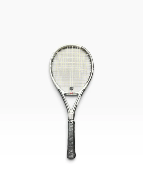 Vist Large View of Product Image Which is Used Wilson TRIAD 3 Adult Tennis Racquet Grey 4 1/4"