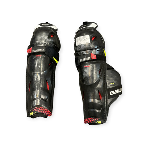 Vist Large View of Product Image Which is Used Bauer HYPERLITE JR 12 SG Junior Shin Guards Black 12"