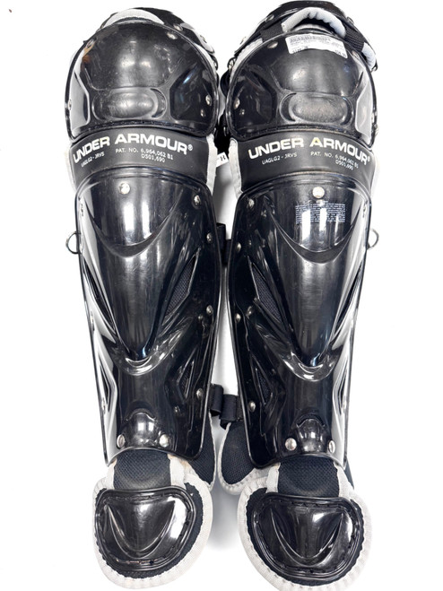 Vist Large View of Product Image Which is Used Under Armour UALG2-JRVS Catchers Leg Guards Black Junior