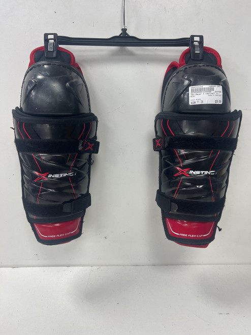 Vist Large View of Product Image Which is Used Bauer X INSTINCT Junior Shin Guards Black 11"